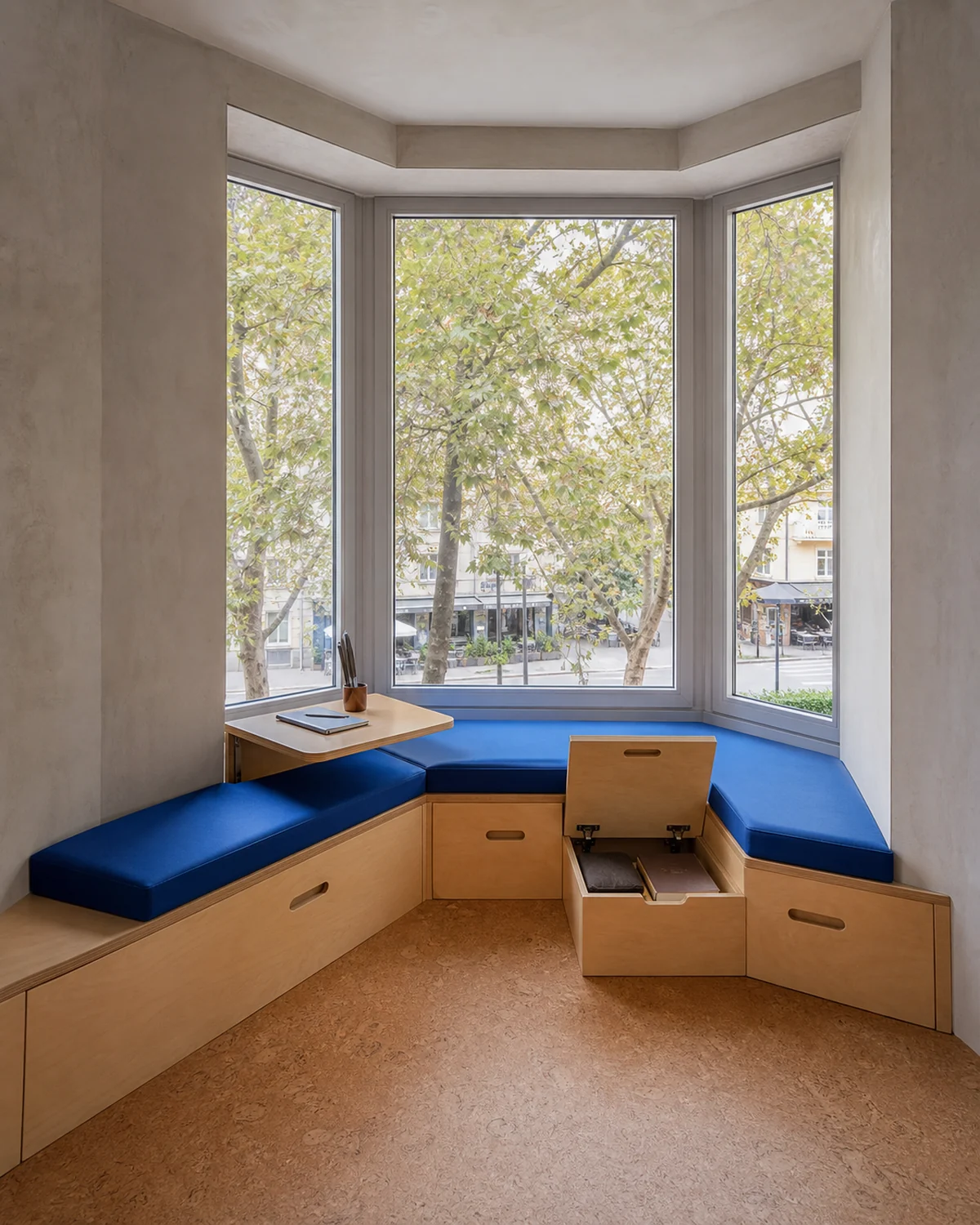 Bespoke Seating Wrapped Around a Faceted Bay — Multipurpose room